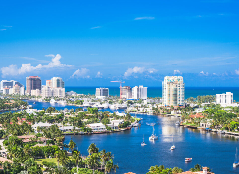 Aerial view of Fort Lauderdale showing buildings, trees, and the ocean
