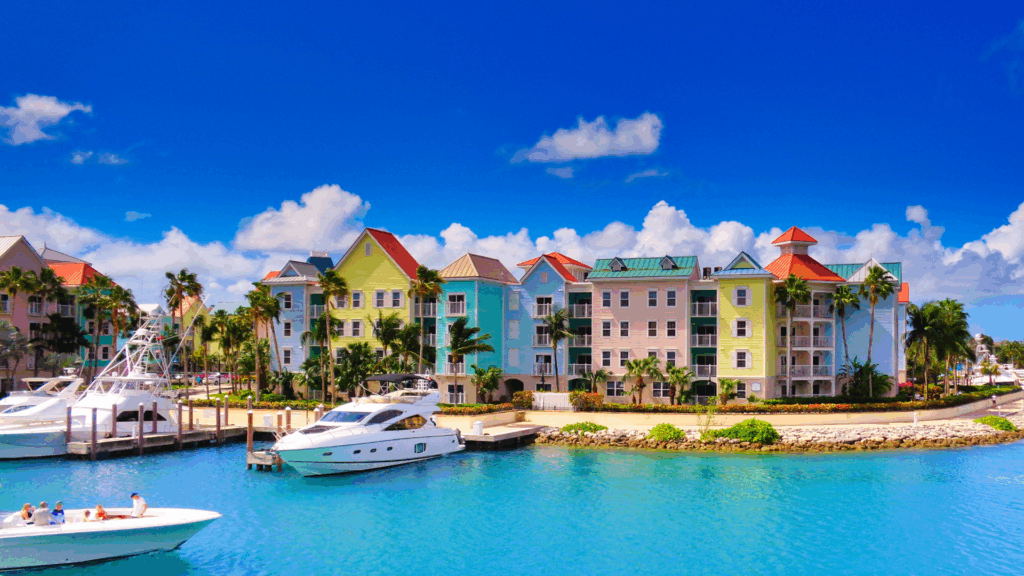 Colorful building and marina in The Bahamas, easy to access flying to Nassau